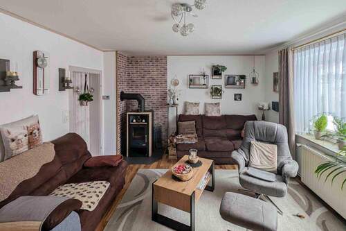 Wohnzimmer (1) - 6 Zimmer Einfamilienhaus zum Kaufen in Harpstedt