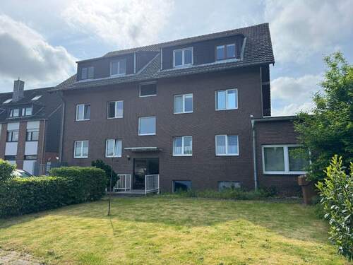 Gartenansicht Wohnhaus - attraktives Wohn- und Geschäftshaus in Neuss-Rosellerheide zu verkaufen!