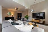 Wohnbereich mit Kamin - Einfamilienhaus mit 132,30 m² in Oldenburg zum Kaufen