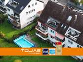 Titelbild - Kleine Hausgemeinschaft, großes Wohngefühl - 3,5 Zimmer mit Balkon, Pool und Blick ins Grüne!