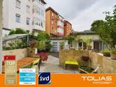 Titelbild - 2-Zimmer Oase mit separatem Bürohäuschen, doppelter Terrassenfreude und modernem Bad