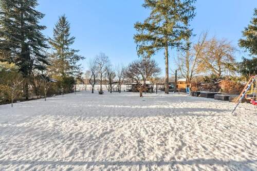 Blick in den Garten - Einfamilienhaus mit 223,00 m&sup2; in Falkensee zum Kaufen