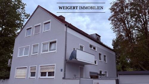 Vorderansicht Gebäude - WEIGERT: Familiengerechte Gartenwohnung mit Hobbyraum in Pasing unweit des Westbad