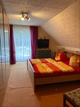 Zimmer im Dachgeschoß - 