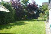 Teil des Gartens - Mehrfamilienhaus, Wohnhaus mit 167,00 m² in Bad Krozingen zum Kaufen