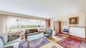 Wohnzimmer mit Blick in den Garten - 7 Zimmer Doppelhaushälfte in Höchberg