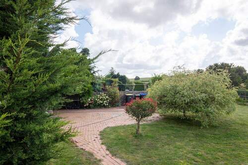 Sitzfläche im Garten - Reihenendhaus mit 110,00 m² in Groß Miltzow zum Kaufen
