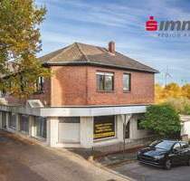 Zentral gelegenes Wohn-Geschäftshaus mit 4 Garagen und weiterer Bauoption - Herzogenrath Merkstein