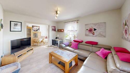 Wohnzimmer mit offenem Lesebereich - Provisionsfrei für Käufer: Familienfreundliches Einfamilienhaus mit Garten & Garagen in Hamm-Pelkum