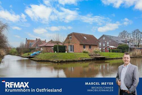 Titelbild - Seltenes Juwel in Greetsiel - Traumhaftes Einfamilienhaus in einzigartiger Wasserlage
