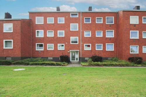 Vorderansicht - Gemütliche 3-Zimmer-Eigentumswohnung mit Balkon und viel Stauraum in Neumünster