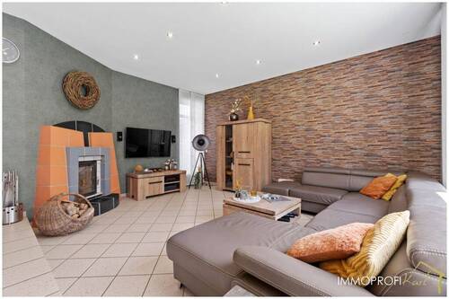 10. Wohnbereich mit Kamin.jpg - 