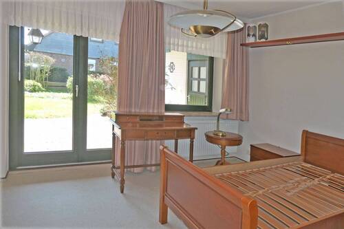 Schlafzimmer mit Zugang zur Terrasse - 