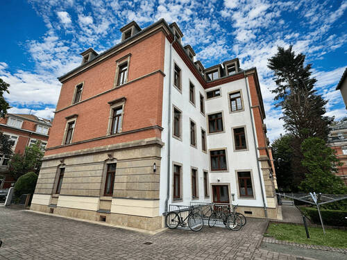 Rückansicht Wohn- und Geschäftshaus - Etagenwohnung mit 72,70 m² in Dresden zum Kaufen