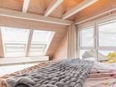 Schlafzimmer im Dachgeschoss mit Traumaussicht - 