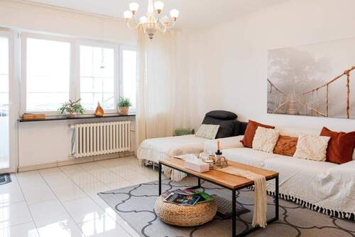 Das gemütliche Wohnzimmer - Moderne 3-Zimmer-ETW mit Rheinblick in Grenzach