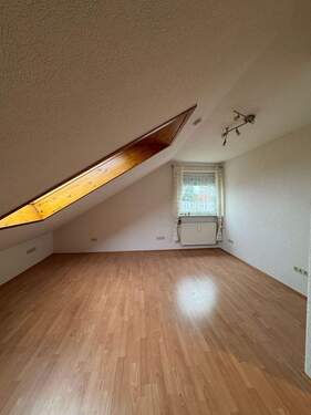 Helles Dachzimmer - 