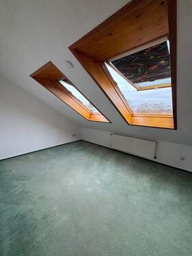 Dachzimmer mit Dachfenstern - 