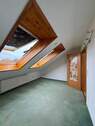 Helles Dachgeschosszimmer - 