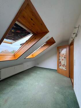 Helles Dachgeschosszimmer - 