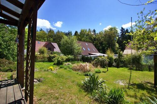 Blick in den Garten - Einfamilienhaus mit 107,20 m&sup2; in Dötlingen zum Kaufen