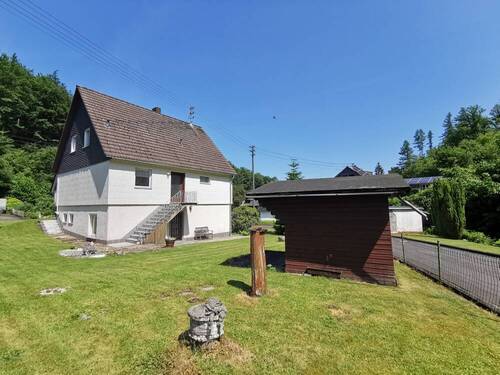 Bild 2 - 6 Zimmer Einfamilienhaus zum Kaufen in Schutzbach