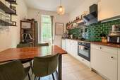 Küche mit Zugang zum Balkon - 