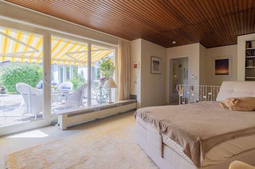Schlafzimmer mit Zugang zur Terrasse - 