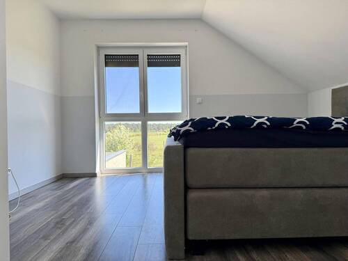 Schlafzimmer im Dachgeschoss - 