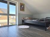 Zimmer im Dachgeschoss - 