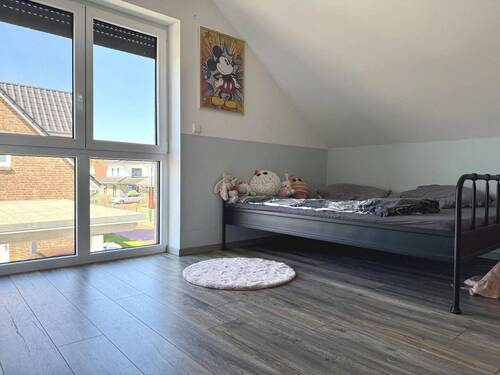 Zimmer im Dachgeschoss - 