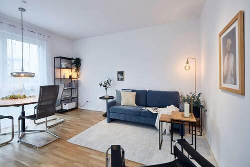 Wohnzimmer Musterwohnung - 4 Zimmer Etagenwohnung in Nürnberg