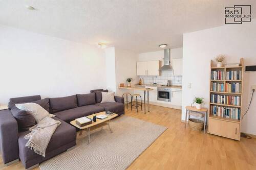 Wohn- und Essbereich - B & B Immobilien: Stilvoll wohnen in Trier-Feyen - durchdachte 2,5-Zimmer-Wohnung mit Balkon