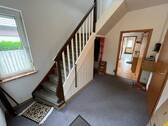 EG Flur und Eingang (1) - Einfamilienhaus mit 128,70 m² in Varel zum Kaufen