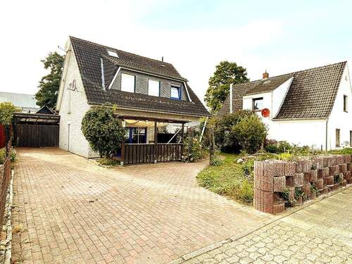 Ansicht Süd-Ost - Volksbank Immobilien: Zentrale Lage - Ein EFH mit Platz für Ihre Familie