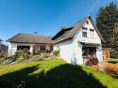 6 Hausansicht mit Terrasse - 