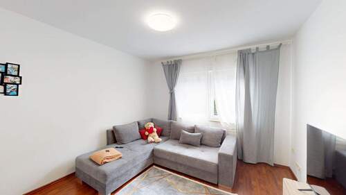 Wohnzimmer / Einheit 1.OG - 