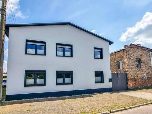 Gebäudeansicht - 7 Zimmer Einfamilienhaus zum Kaufen in Wiedemar