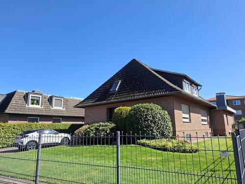 Ansicht - Mehrfamilienhaus, Wohnhaus mit 185,00 m&sup2; in Neu Wulmstorf zum Kaufen