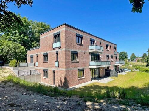 Hausansicht hinten - Moderne 2-Zimmer-Wohnung in Toplage