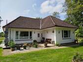 Außenansicht - Gepflegter Winkelbungalow mit Wintergarten und Hauskoppel in Wiemerstedt