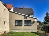 Ansicht Gebäuderückseite - Einfamilienhaus mit 110,00 m² in Schönwölkau zum Kaufen