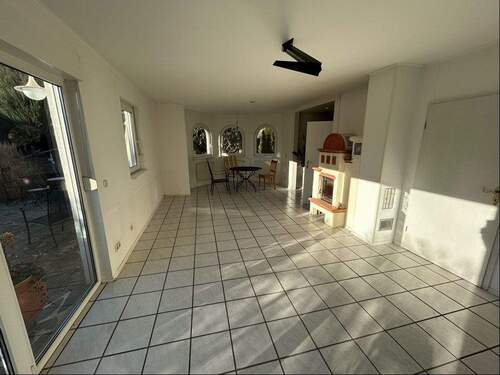 Wohnzimmer mit Kachelofen - 