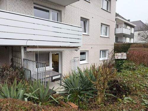 1_Ansicht - Attraktive Souterrain-Wohnung mit Terrasse Top Lage in Dortmund-Schüren