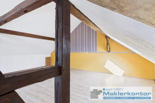 Dachgeschoss/Wohnbereich mit Kamin - 