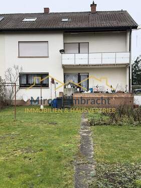 Rückansicht vom Garten aus - Mehrfamilienhaus, Wohnhaus mit 180,70 m&sup2; in Breisach am Rhein zum Kaufen