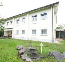 Geschäftsgebäude mit Garten und Terrasse - Murg