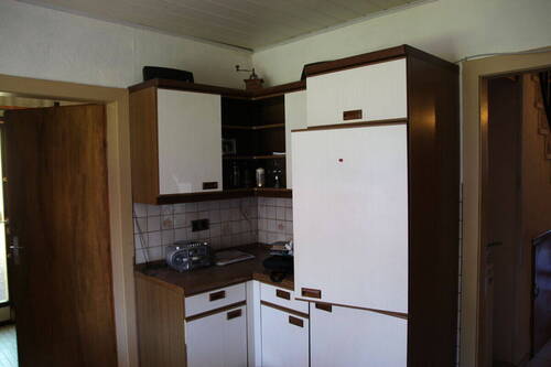 Küchenbereich mit direktem Zugang zum Flur und kurzen Wegen zum Esszimmer - 