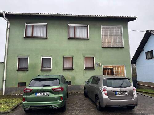 Vorderansicht - Wannemacher Immobilien **** Geräumiges Einfamilienhaus mit viel Potential mit zwei Wohneinheiten in Heiligenwald ****