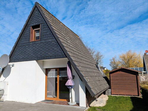 Terrasse mit Gartenansicht - Mehrfamilienhaus, Wohnhaus mit 50,00 m² in Harlesiel zum Kaufen